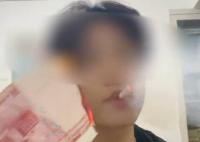 男子為炫富燒100元點(diǎn)煙被罰1萬(wàn) 民警依法對(duì)其處以警告